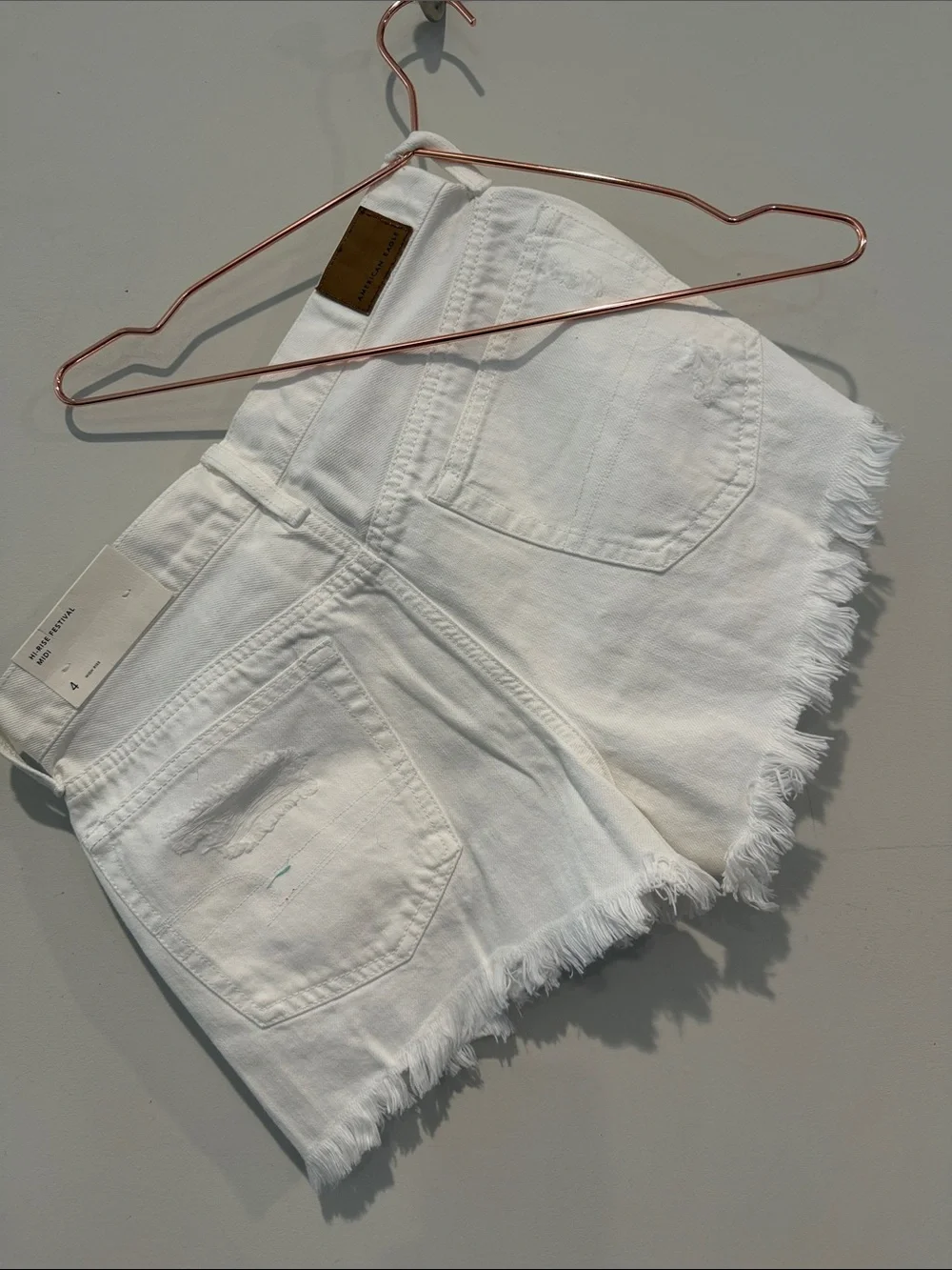 American Eagle Outfitters White Distressed Denim Cutoff Shorts. High rise.